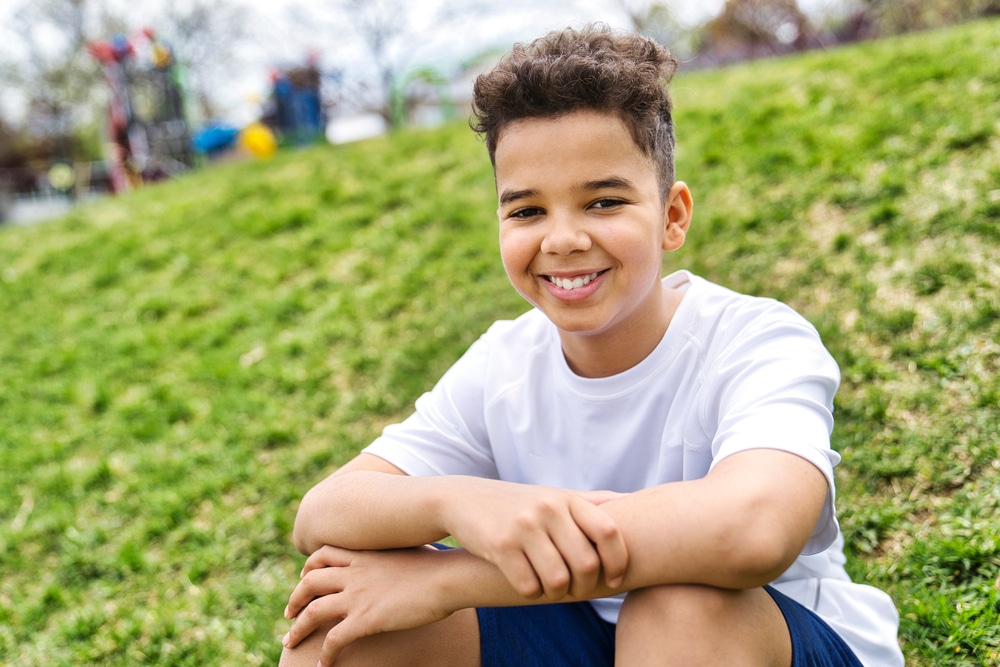 A,Teen,Afro,American,Boy,In,The,Garden,On,The