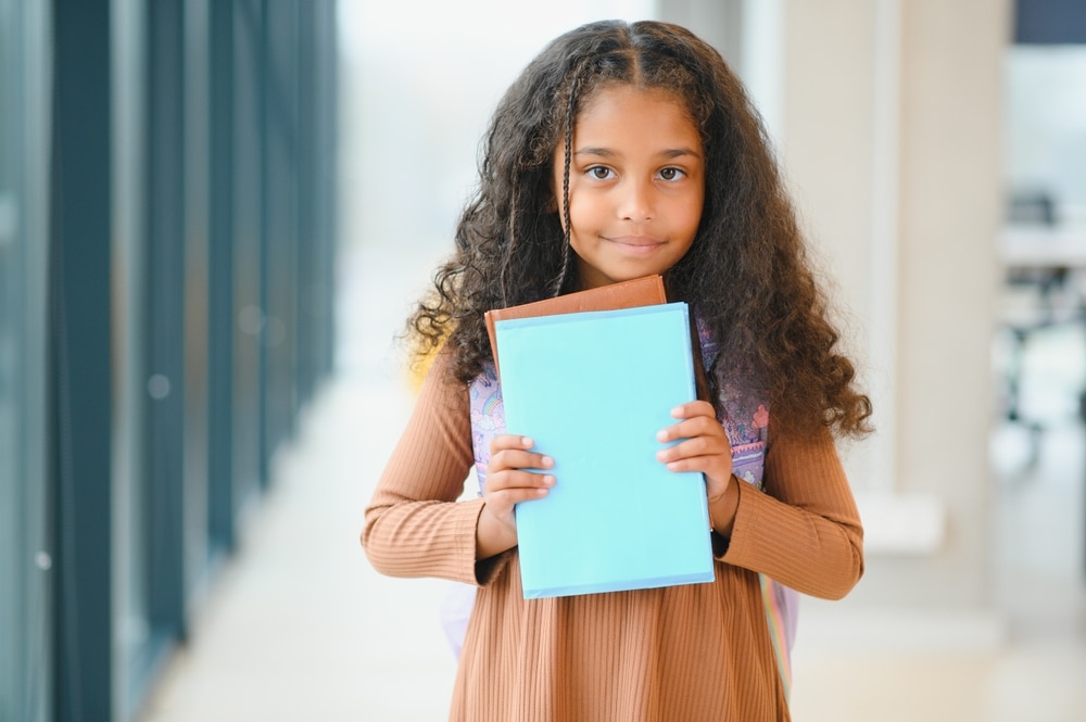 Portrait,Of,Cute,African american,Girl,At,School.