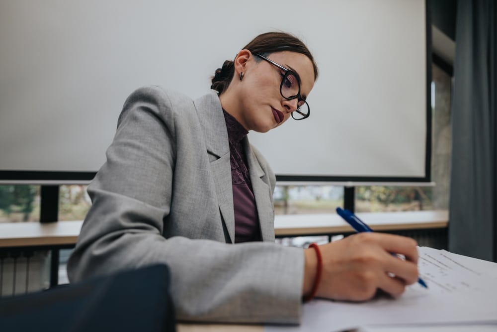 A,Female,Teacher,In,A,Professional,Setting,Is,Focused,On