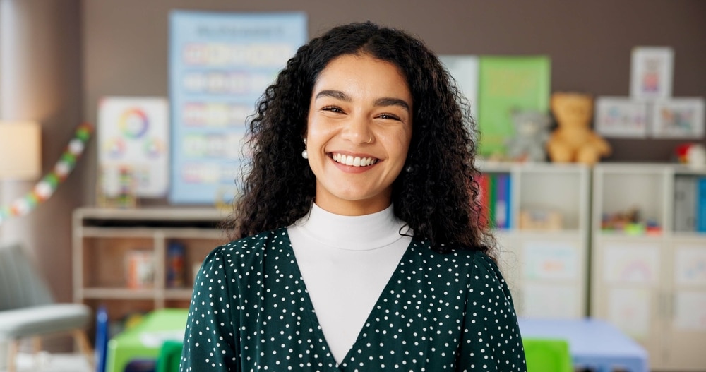 Woman,,Teacher,And,Portrait,In,Classroom,With,Smile,,Confidence,And